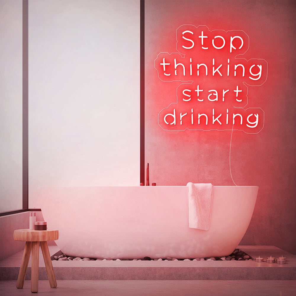 Enseigne néon stop thinking start drinking
