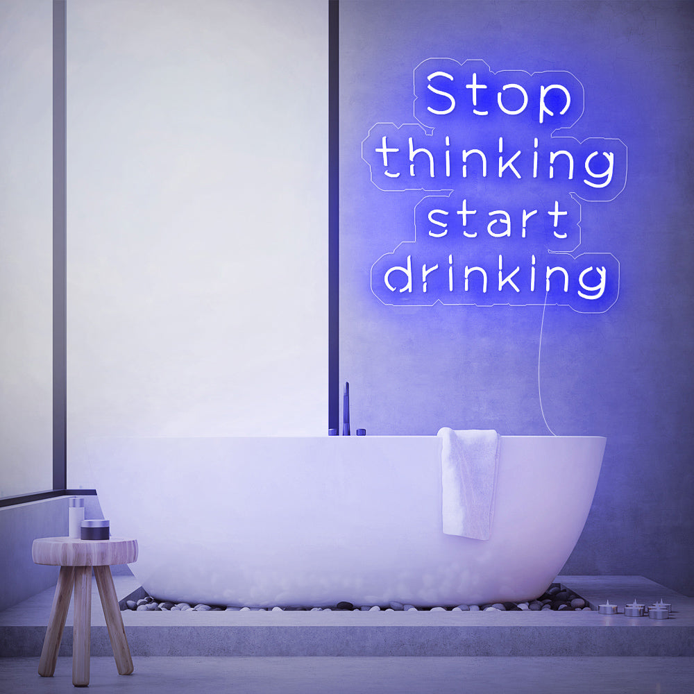 Enseigne néon stop thinking start drinking