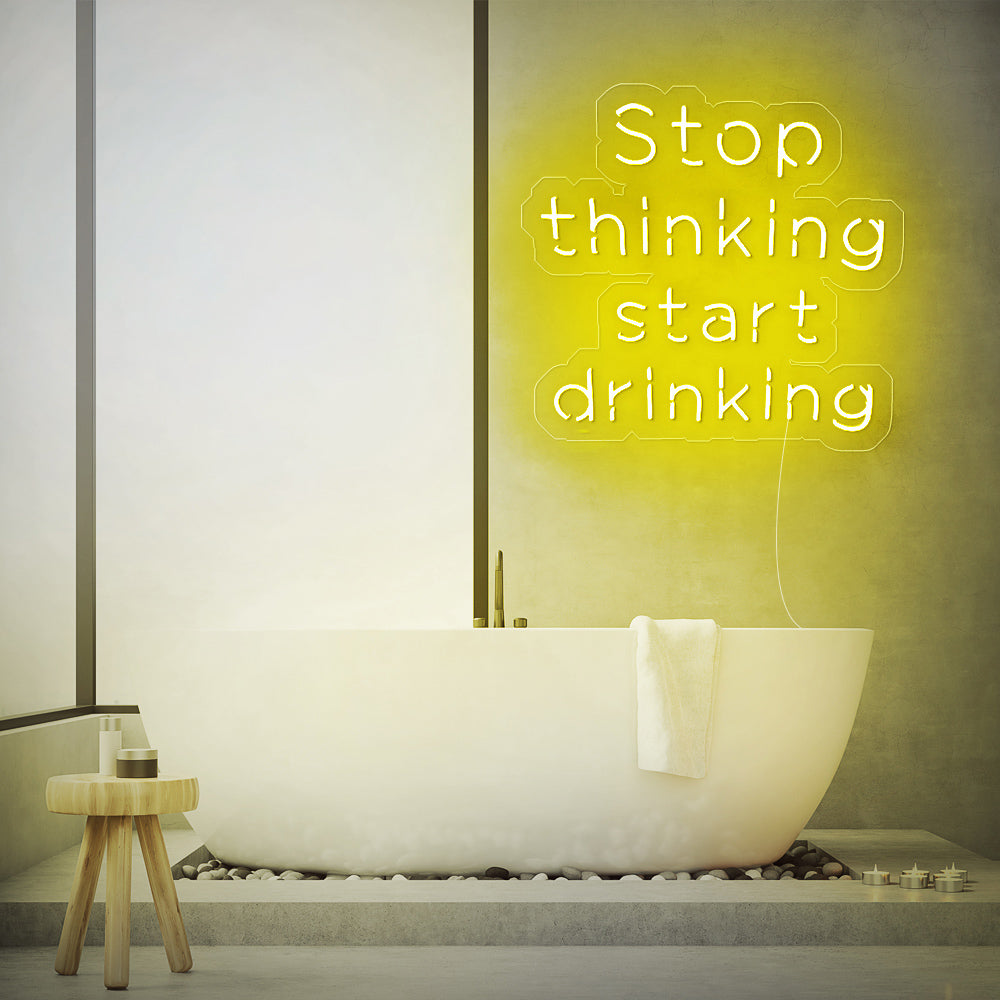 Enseigne néon stop thinking start drinking
