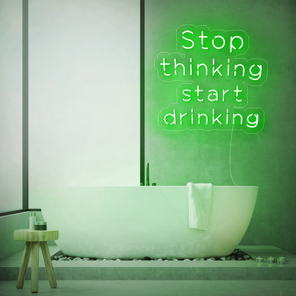Enseigne néon stop thinking start drinking