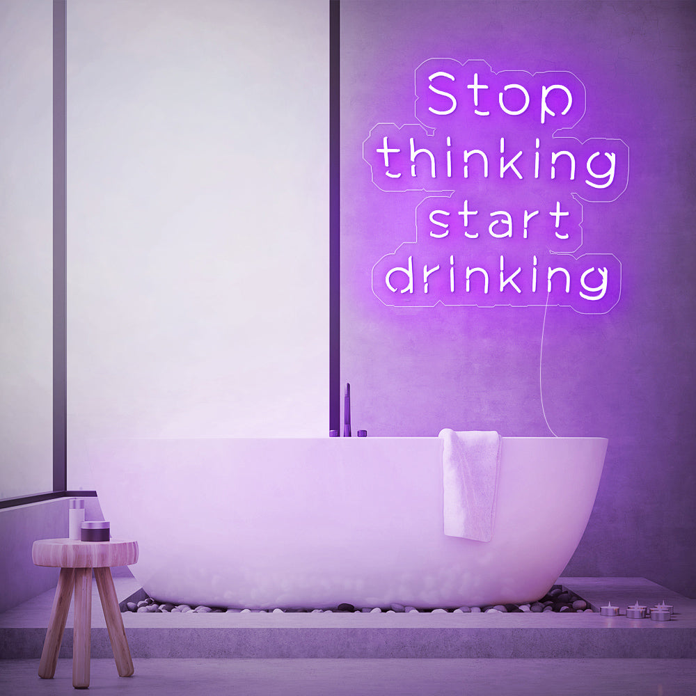 Enseigne néon stop thinking start drinking