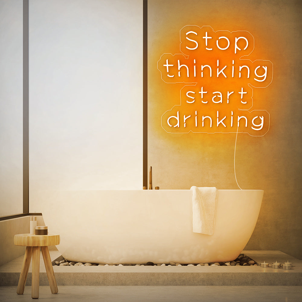 Enseigne néon stop thinking start drinking