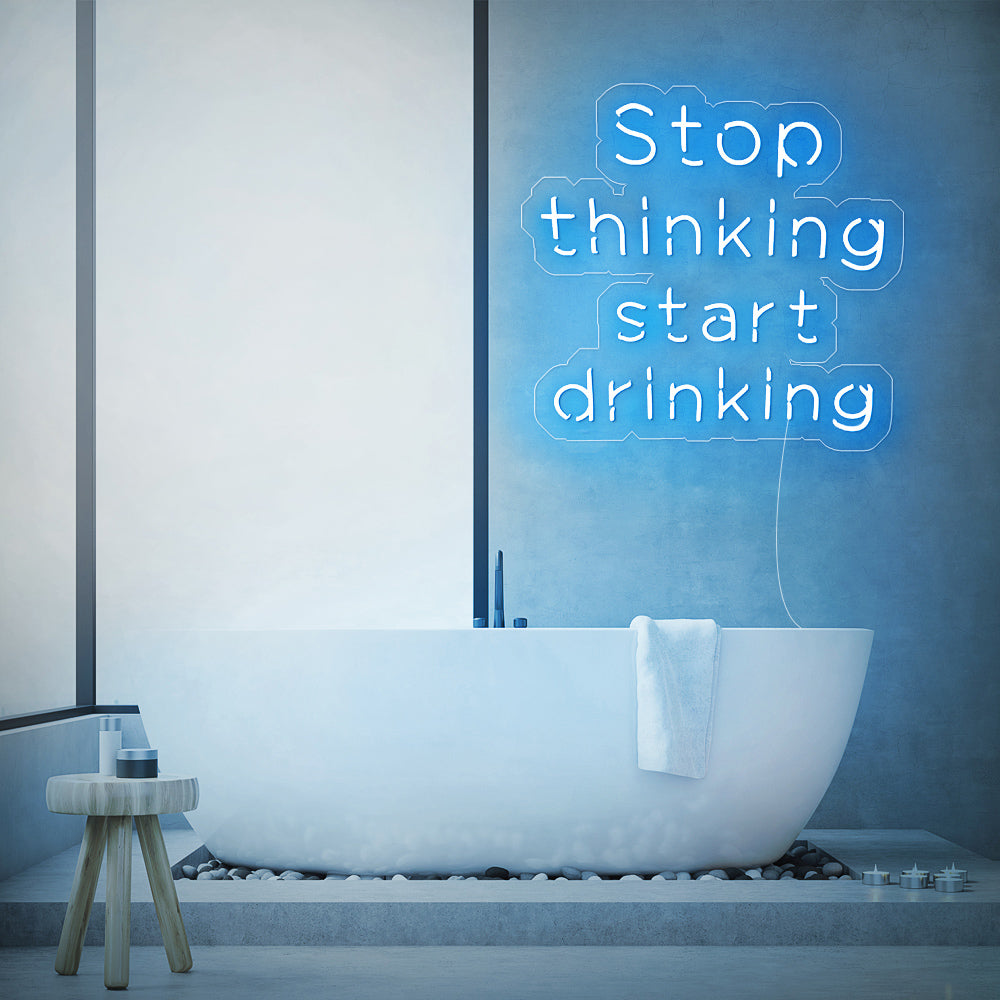 Enseigne néon stop thinking start drinking
