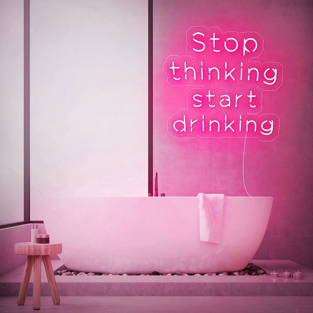 Enseigne néon stop thinking start drinking