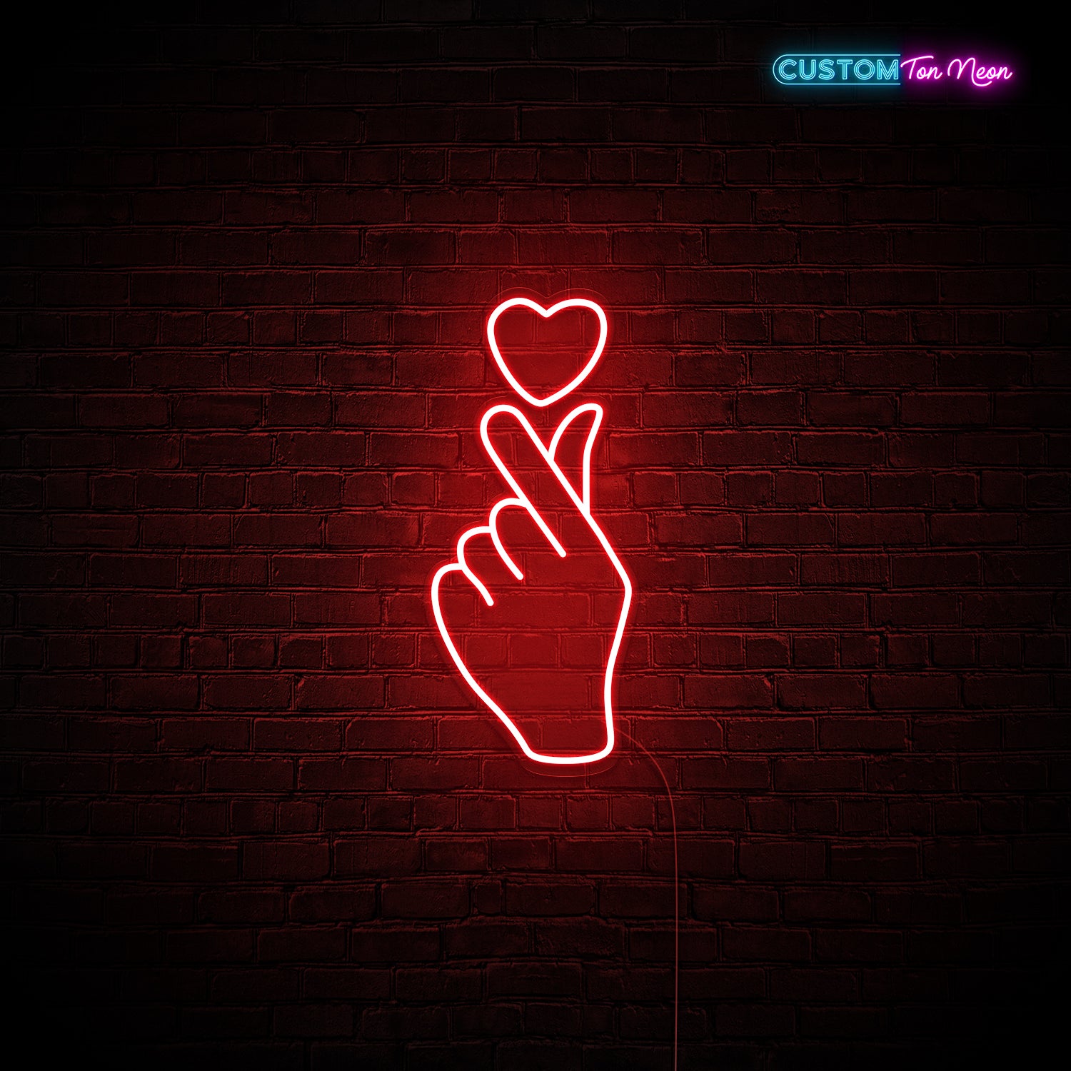 Enseigne néon main d'amour