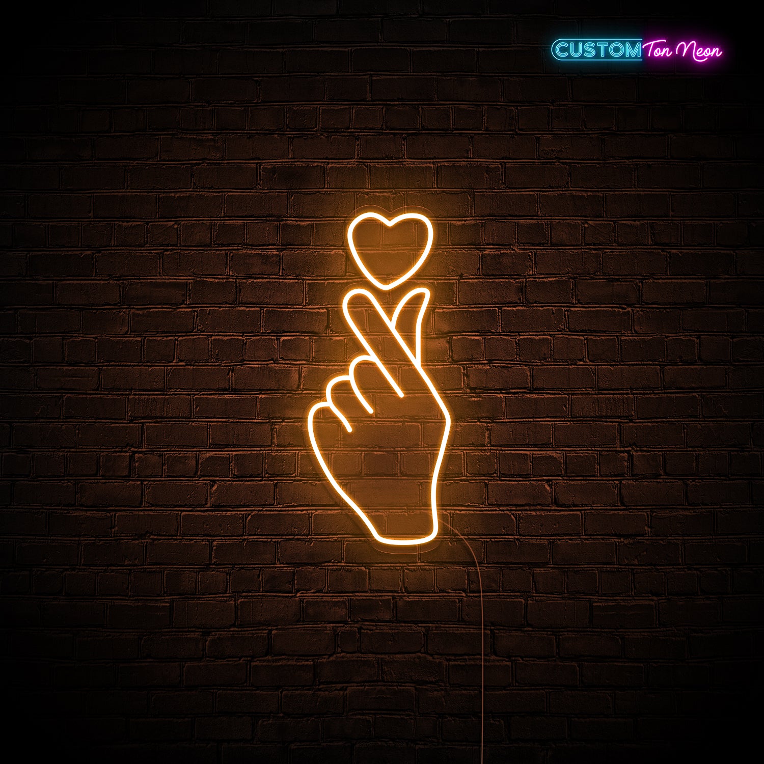 Enseigne néon main d'amour