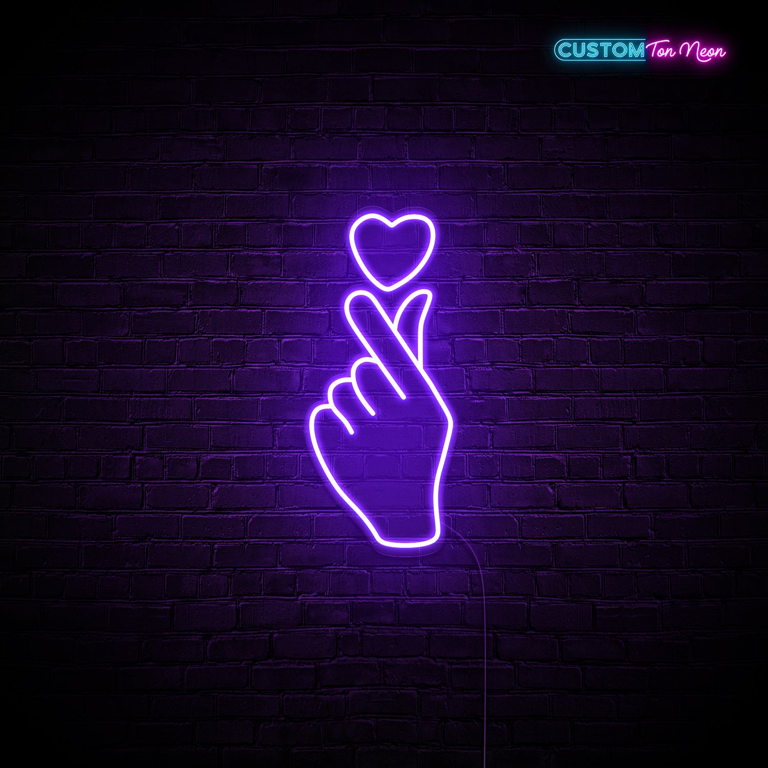 Enseigne néon main d'amour