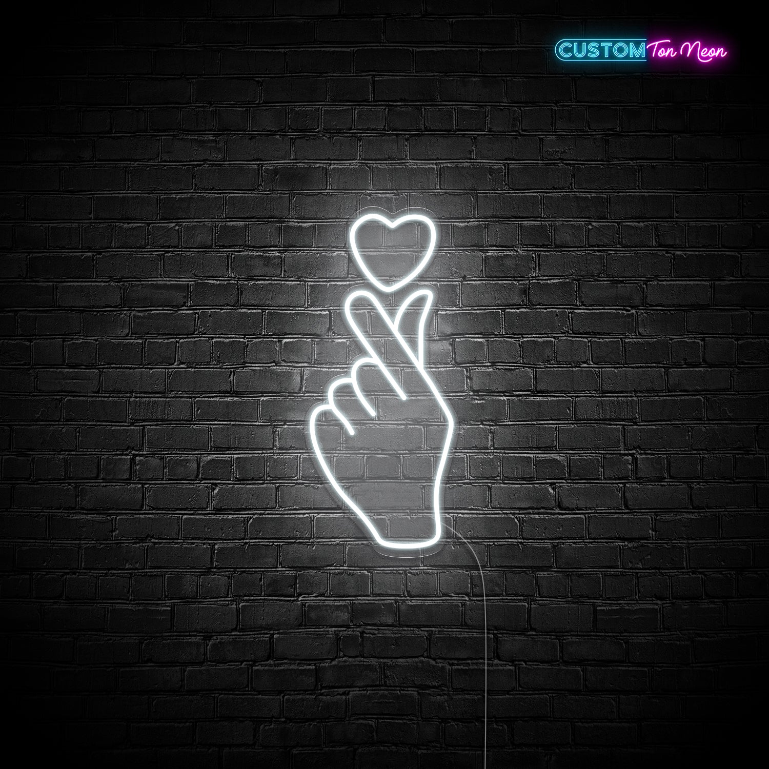 Enseigne néon main d'amour