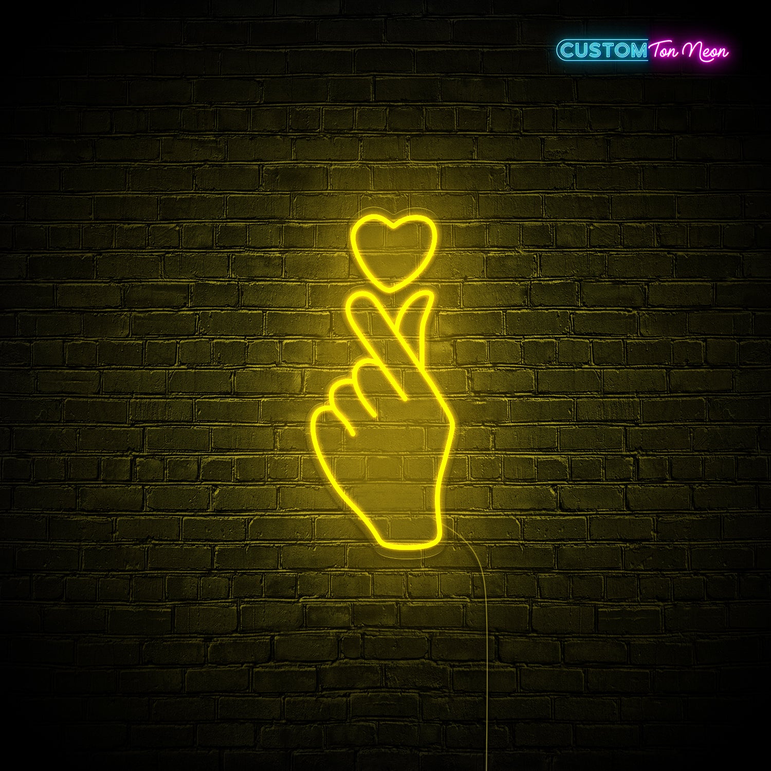 Enseigne néon main d'amour